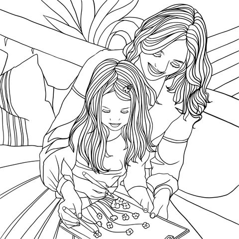 Mother - daughter enjoying a coloring - page activity together