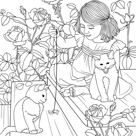 Girl playing with cats among the flowers