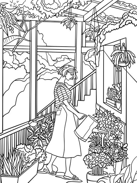 Woman watering flowers on the balcony