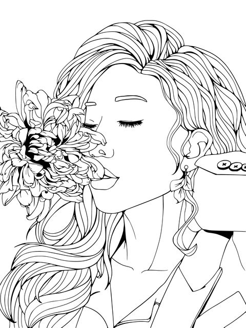 Woman Smelling a Flower