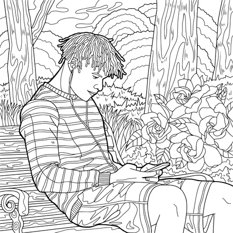 Man listening to music on a park bench