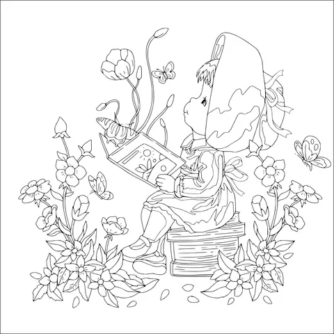 Little girl reading among flowers