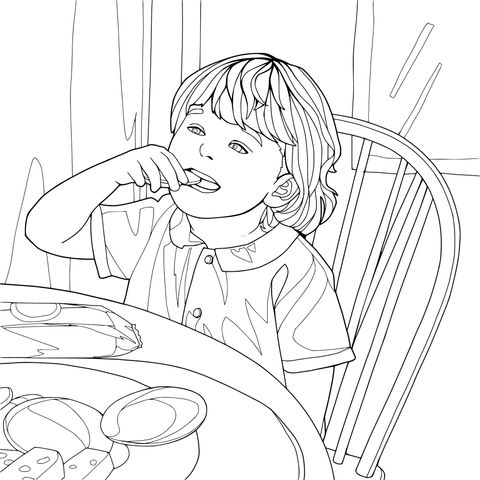 食卓で食べている子供