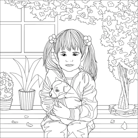 Little girl holding a puppy
