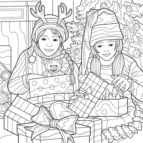 クリスマスツリーの下で贈り物を開ける女の子たち