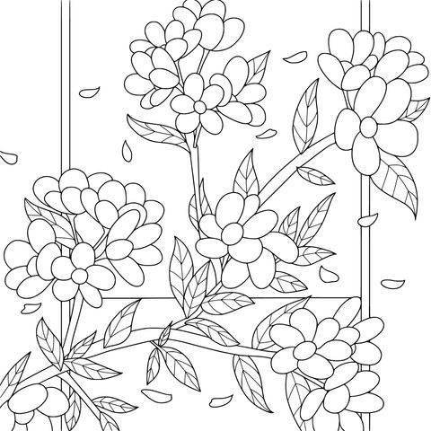 窓際で咲くピンクの花