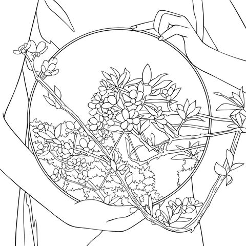 Holding a view of blooming flowers in a round frame
