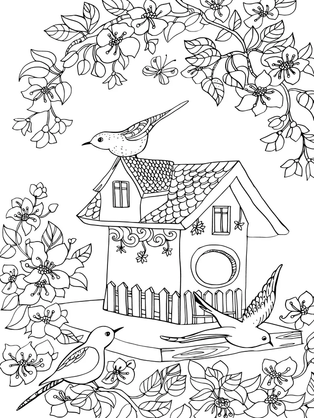 A Birdhouse Surrounded by Blooming Flowers