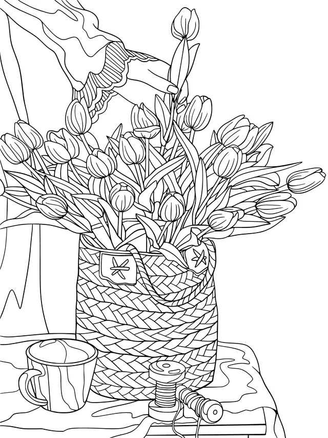 Hand - inserting tulips into a woven bag