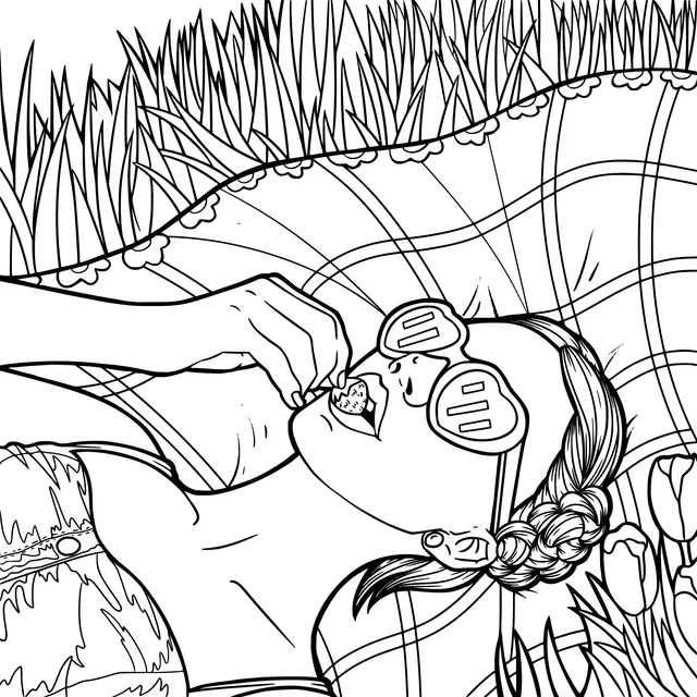 Woman leisurely eating strawberries on the grass